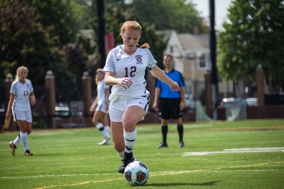 Gannon University's women's soccer player about to kick the ball