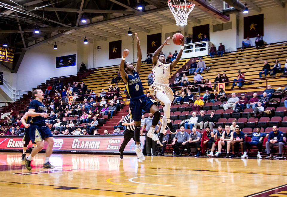Gannon University's men's basketball player making a lay up