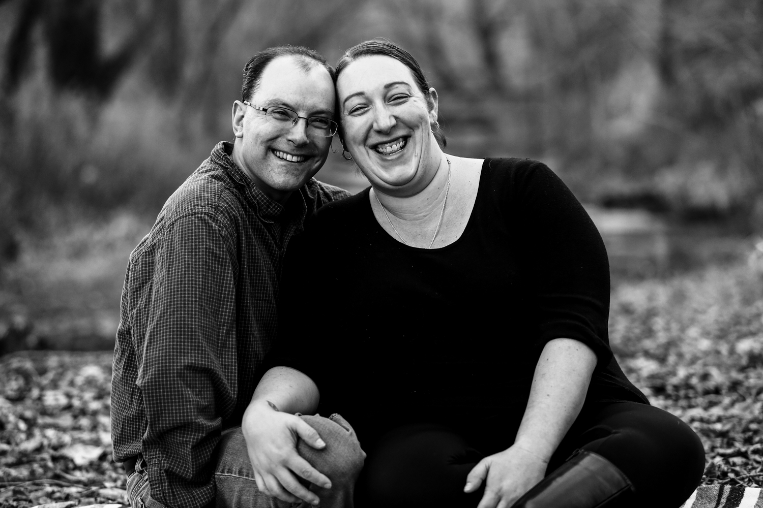 Couple poses together during Frontier Park family portraits session